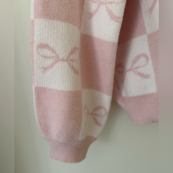Sincerely Jules Baby Pink and White Knit Bow Cardigan
Size: Small
NWT - Picture 8 of 15